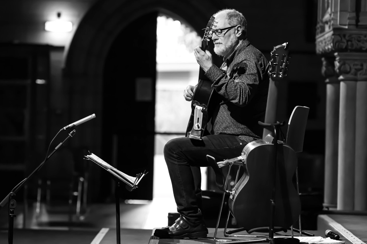 Michael Knof performing in a church